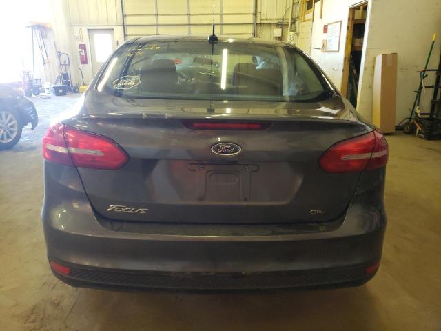 Foto 6 de la subasta – 2018 FORD FOCUS SE con VIN 1FADP3F26JL303698