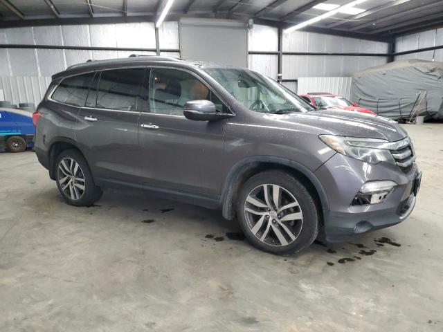 Photo 4 from auction – 2016 HONDA PILOT ELIT with VIN 5FNYF6H09GB045281