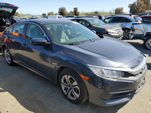 Photo 4 from auction – 2017 HONDA CIVIC LX with VIN 2HGFC2F51HH567830