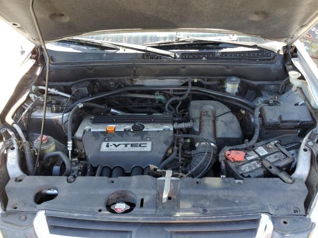 Photo 11 from auction – 2004 HONDA CR-V LX with VIN JHLRD68474C005953
