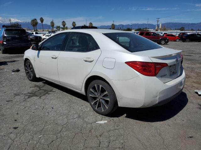 Photo 2 from auction – 2017 TOYOTA COROLLA L with VIN 5YFBURHE9HP692813