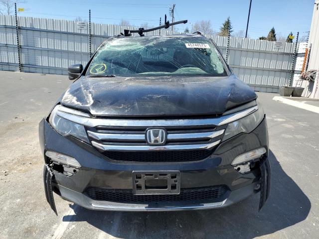 Photo 5 from auction – 2016 HONDA PILOT TOUR with VIN 5FNYF6H99GB104196