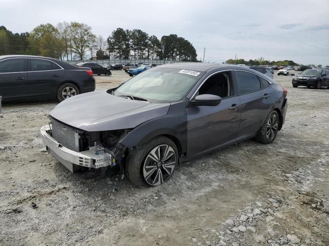 HONDA CIVIC EX 2017 with VIN 19XFC1F34HE027567 - Photo from auction