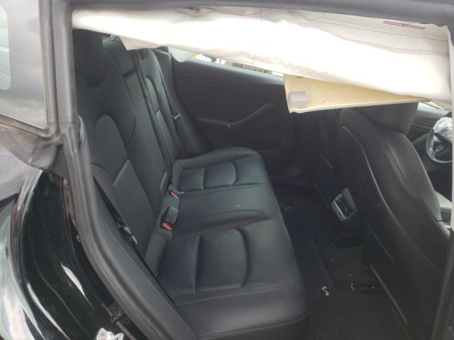 Photo 10 from auction – 2020 TESLA MODEL 3 with VIN 5YJ3E1EC0LF713154