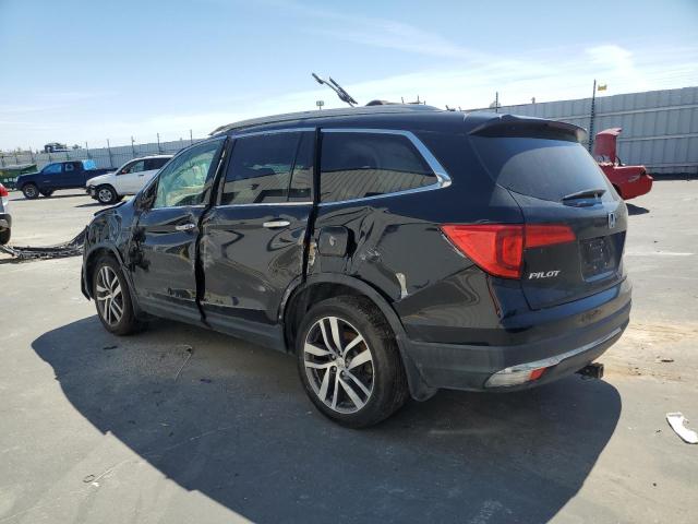 Photo 2 from auction – 2016 HONDA PILOT TOUR with VIN 5FNYF6H99GB104196