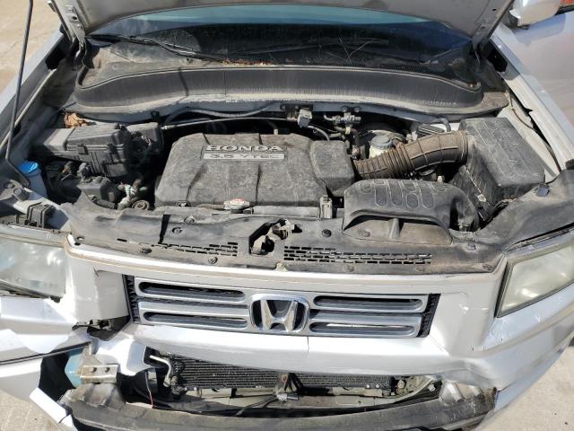 Photo 11 from auction – 2007 HONDA RIDGELINE with VIN 2HJYK16517H533949