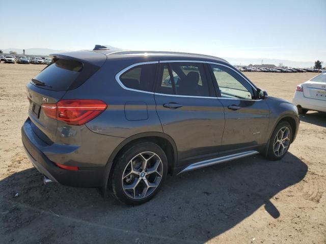 Photo 3 from auction – 2018 BMW X1 XDRIVE2 with VIN WBXHT3Z34J4A66415