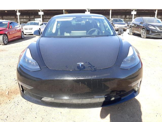 Photo 5 from auction – 2021 TESLA MODEL 3 with VIN 5YJ3E1EA5MF090890