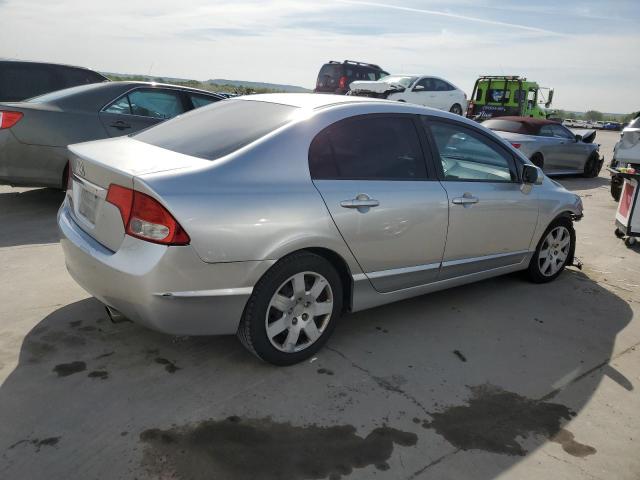 Photo 3 from auction – 2011 HONDA CIVIC LX with VIN 2HGFA1F52BH309839