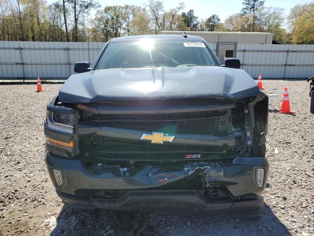 Photo 5 from auction – 2018 CHEVROLET SILVERADO with VIN 3GCUKREC1JG142552
