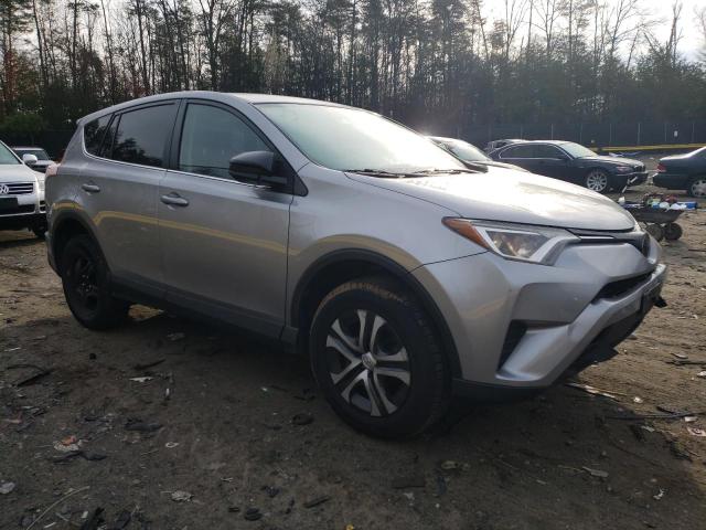 Photo 4 from auction – 2018 TOYOTA RAV4 LE with VIN 2T3BFREV2JW725709