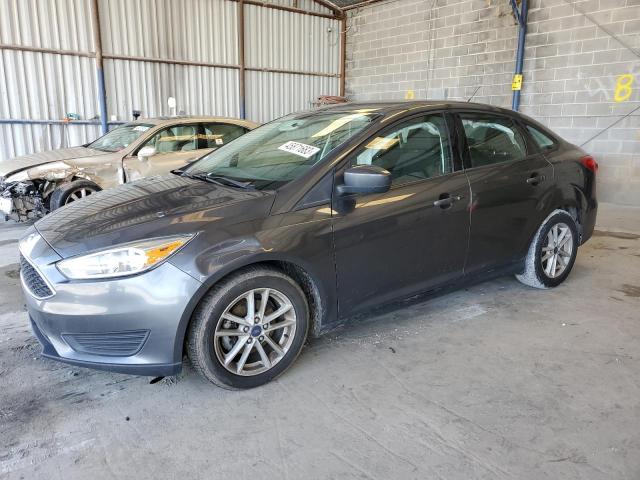 FORD FOCUS SE 2018 with VIN 1FADP3F28JL206695 - Photo from auction