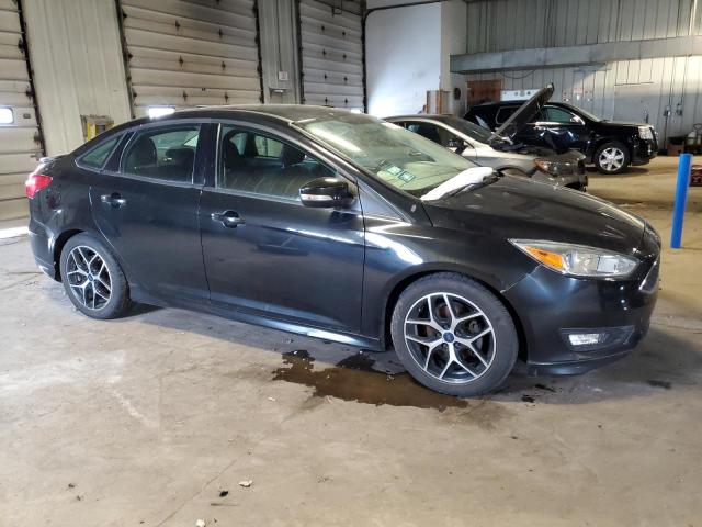 Photo 4 from auction – 2015 FORD FOCUS SE with VIN 1FADP3F21FL268544