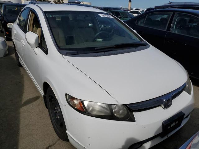 Photo 5 from auction – 2006 HONDA CIVIC HYBR with VIN JHMFA36236S003360