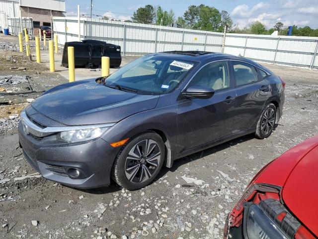 HONDA CIVIC EX 2018 with VIN JHMFC1F33JX034403 - Photo from auction