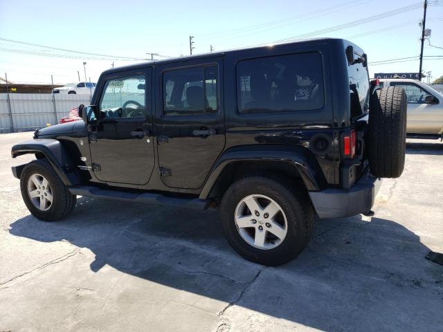 Photo 2 from auction – 2011 JEEP WRANGLER U with VIN 1J4HA7H1XBL600378