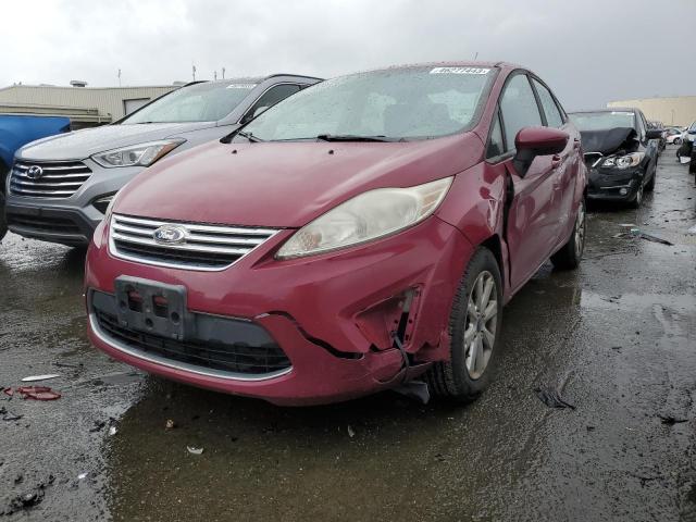FORD FIESTA 2011 with VIN 3FADP4BJ8BM149109 - Photo from auction