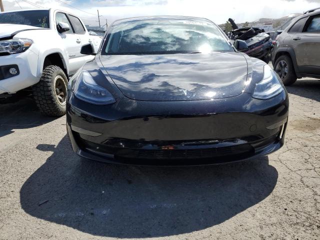 Photo 5 from auction – 2022 TESLA MODEL 3 with VIN 5YJ3E1EB9NF207266
