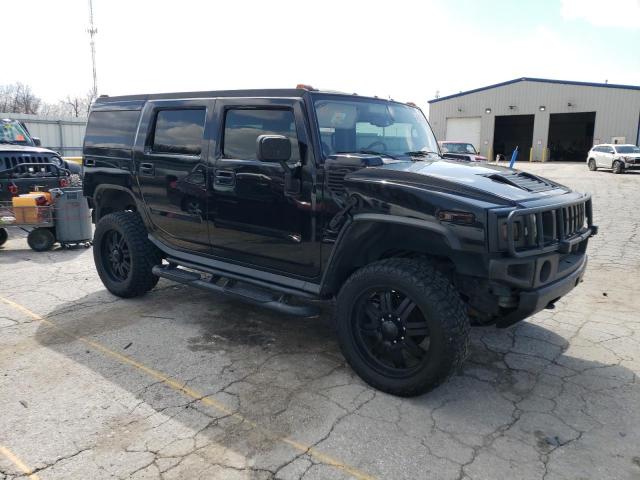 Фото 4 с аукциона – 2003 HUMMER H2 с VIN 5GRGN23U73H108839