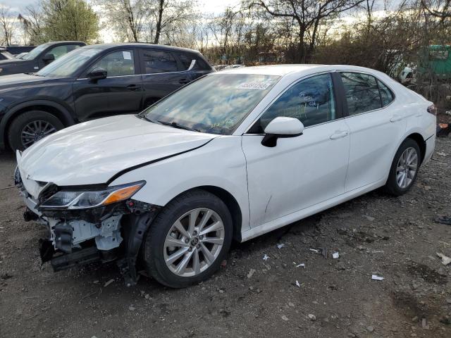 TOYOTA CAMRY LE 2021 with VIN 4T1C11AK2MU563237 - Photo from auction