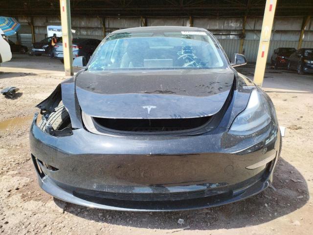 Photo 5 from auction – 2022 TESLA MODEL 3 with VIN 5YJ3E1EA6NF190093