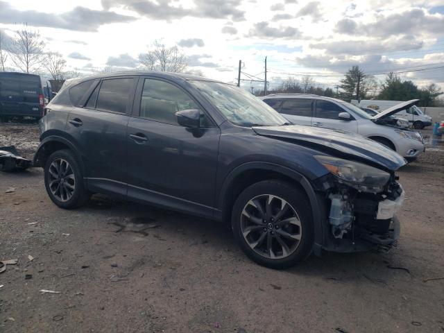 Photo 4 from auction – 2016 MAZDA CX-5 GT with VIN JM3KE4DY7G0792280