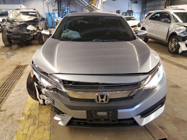 Photo 5 from auction – 2017 HONDA CIVIC LX with VIN 19XFC2F50HE075672