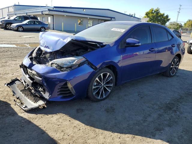 TOYOTA COROLLA L 2018 with VIN 5YFBURHE8JP784713 - Photo from auction