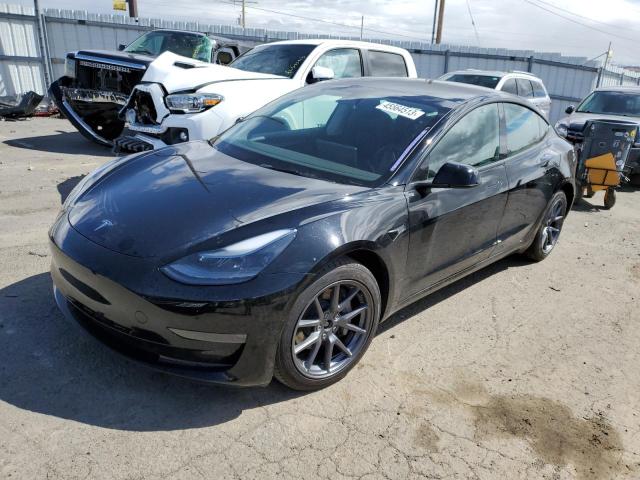 TESLA MODEL 3 2022 with VIN 5YJ3E1EB9NF207266 - Photo from auction