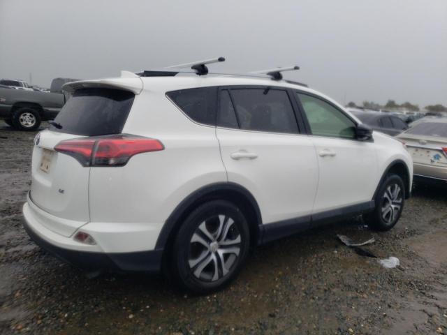 Photo 3 from auction – 2018 TOYOTA RAV4 LE with VIN JTMZFREV5JJ157680