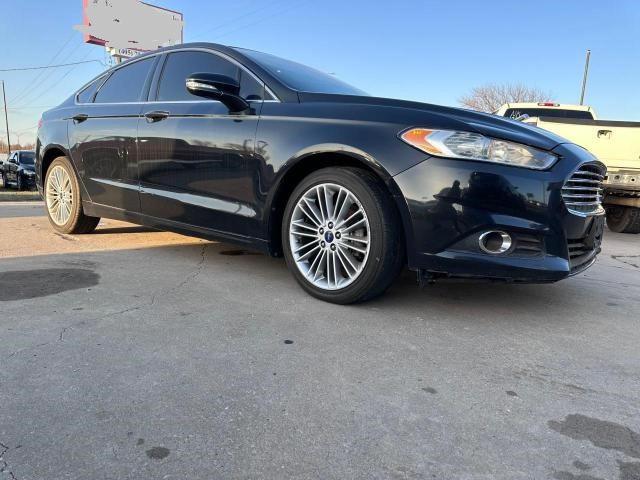 FORD FUSION SE 2014 with VIN 3FA6P0HD6ER354647 - Photo from auction