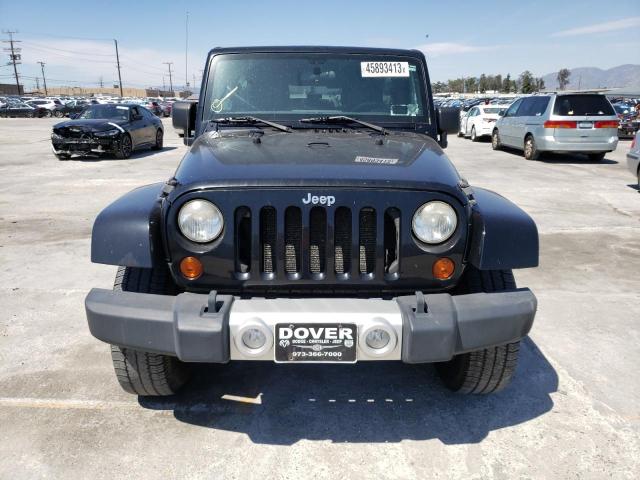 Photo 5 from auction – 2011 JEEP WRANGLER U with VIN 1J4HA7H1XBL600378