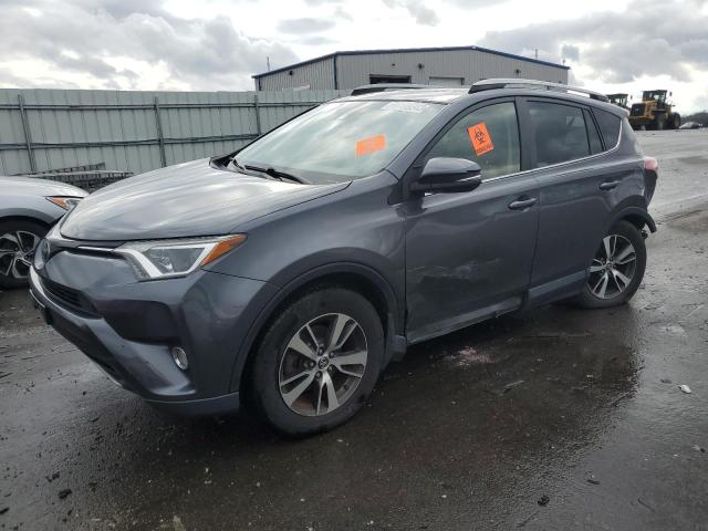 TOYOTA RAV4 XLE 2017 with VIN JTMRFREV8HD211109 - Photo from auction