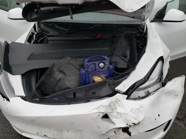 Photo 11 from auction – 2022 TESLA MODEL Y with VIN 7SAYGDEE5NF480106