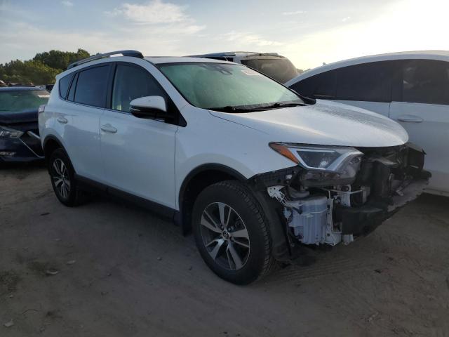 Photo 4 from auction – 2017 TOYOTA RAV4 XLE with VIN JTMRFREV1HD209265