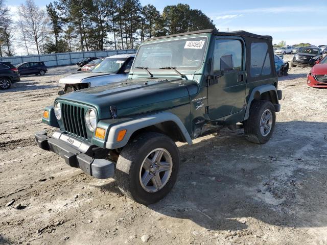 JEEP WRANGLER / 2000 with VIN 1J4FA49S2YP704412 - Photo from auction