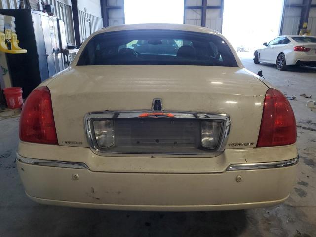 Photo 6 from auction – 2004 LINCOLN TOWN CAR U with VIN 1LNHM83W84Y657766