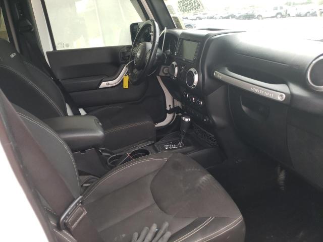 Photo 7 from auction – 2015 JEEP WRANGLER U with VIN 1C4BJWFGXFL766533