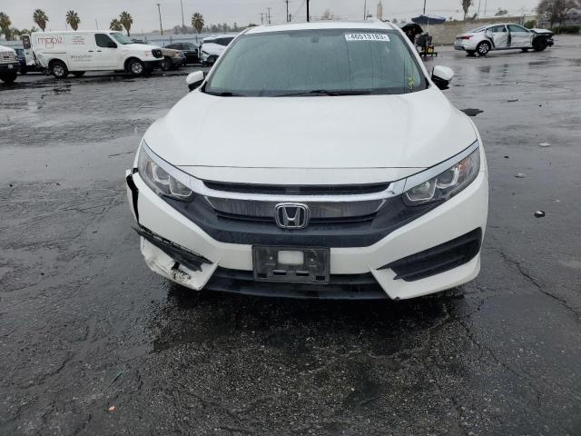 Photo 5 from auction – 2018 HONDA CIVIC EX with VIN 19XFC2F79JE206475