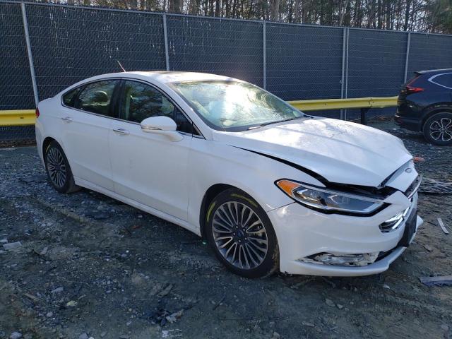 Photo 4 from auction – 2018 FORD FUSION TIT with VIN 3FA6P0D99JR226091