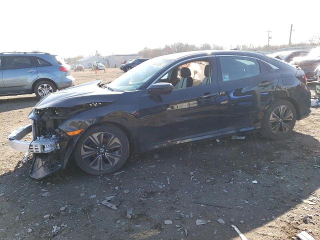 HONDA CIVIC EX 2018 with VIN SHHFK7H54JU413117 - Photo from auction