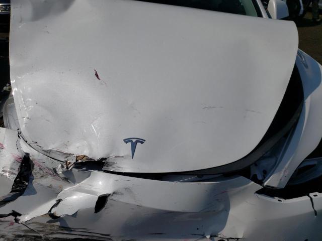 Photo 12 from auction – 2022 TESLA MODEL Y with VIN 7SAYGDEE1NF544416