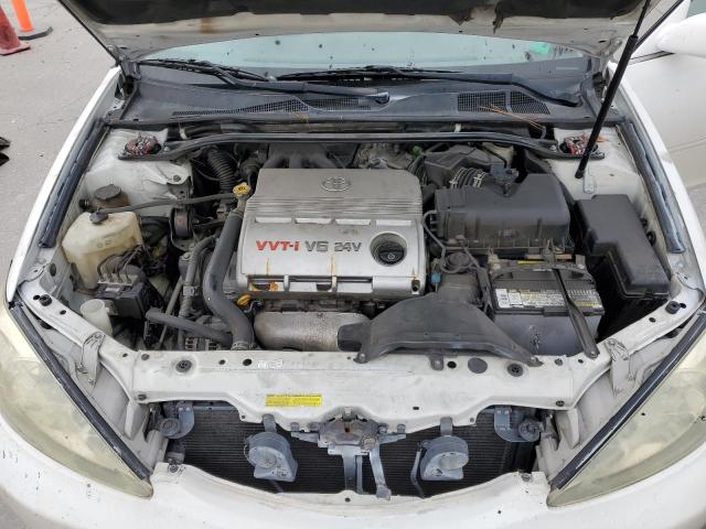 Photo 11 from auction – 2004 TOYOTA CAMRY LE with VIN 4T1BF32KX4U075550