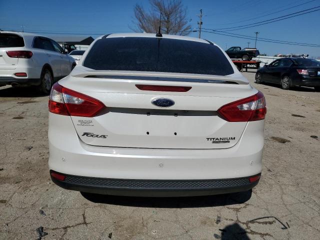 Photo 6 from auction – 2014 FORD FOCUS TITA with VIN 1FADP3J22EL204728