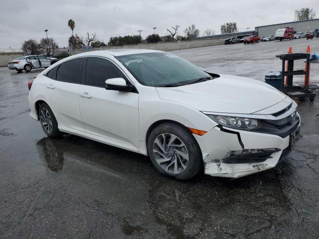 Photo 4 from auction – 2018 HONDA CIVIC EX with VIN 19XFC2F79JE206475