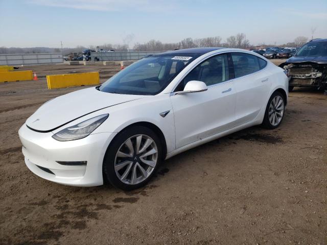TESLA MODEL 3 2018 with VIN 5YJ3E1EB5JF067582 - Photo from auction