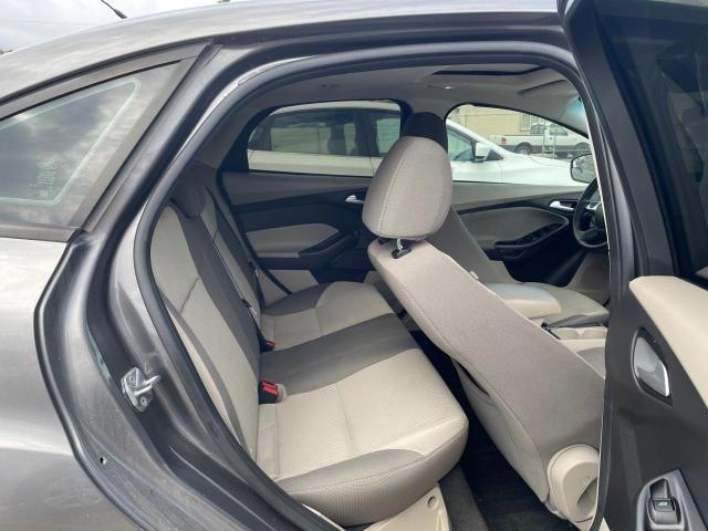Photo 6 from auction – 2014 FORD FOCUS SE with VIN 1FADP3F25EL272059