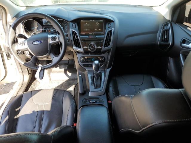 Photo 8 from auction – 2014 FORD FOCUS TITA with VIN 1FADP3J22EL204728