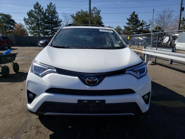Photo 5 from auction – 2018 TOYOTA RAV4 SE with VIN JTMJFREV0JJ185710