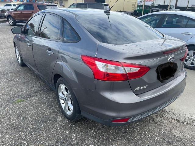 Photo 3 from auction – 2014 FORD FOCUS SE with VIN 1FADP3F25EL272059